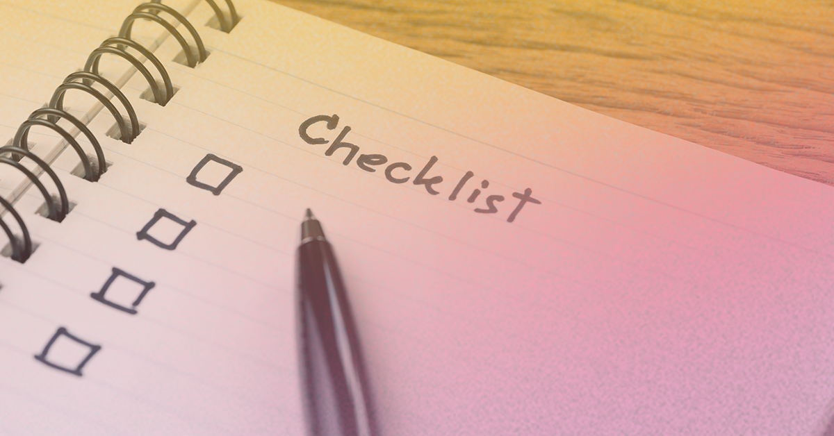 Building a healthy habit: A spiral notebook reads "Checklist" at the top of the page. A pen rests on top of the notebook alongside four open checkboxes. The image is slightly skewed by a purplish orange gradient.